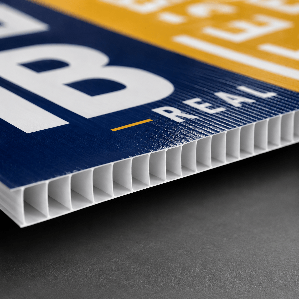 Close-up view of corrugated coroplast yard sign material and print quality