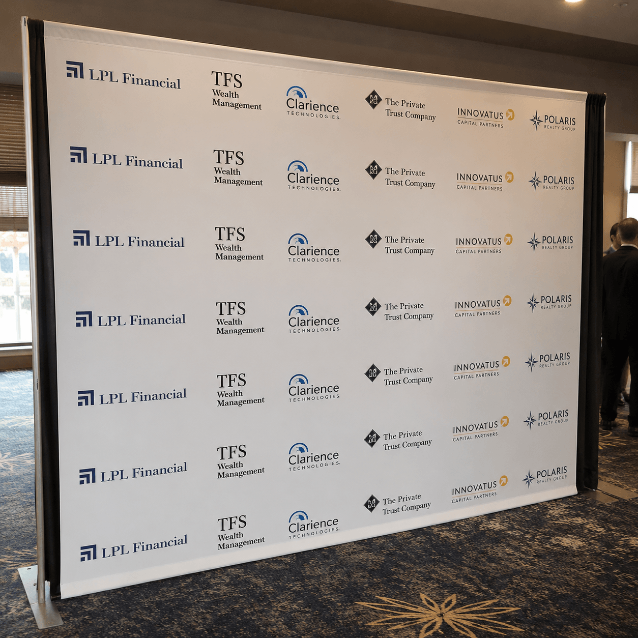 Step and repeat sponsor backdrop used at corporate networking event
