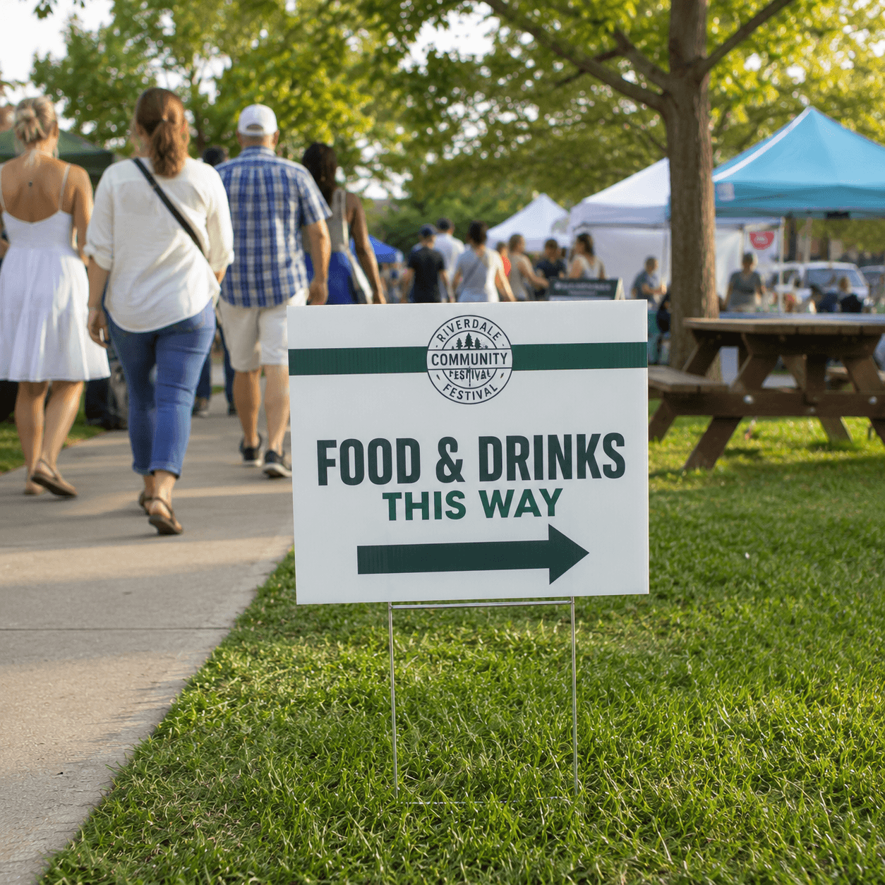 Directional coroplast yard sign at outdoor community event