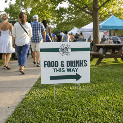 Directional coroplast yard sign at outdoor community event